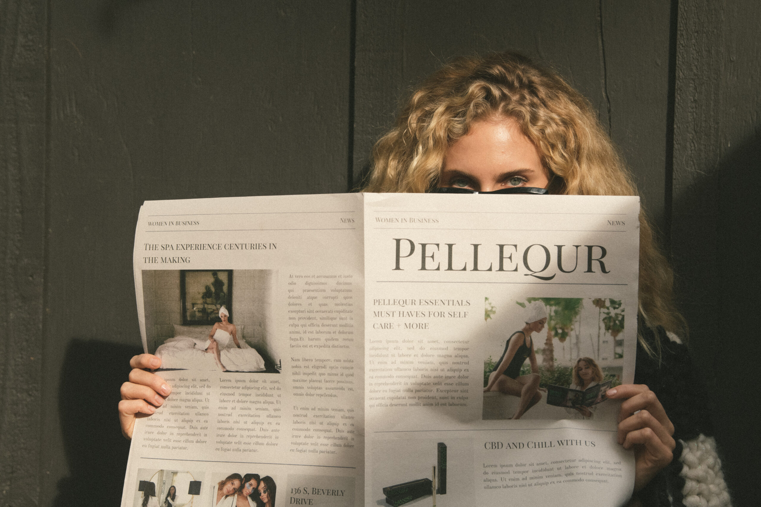 pellequr model reading newspaper